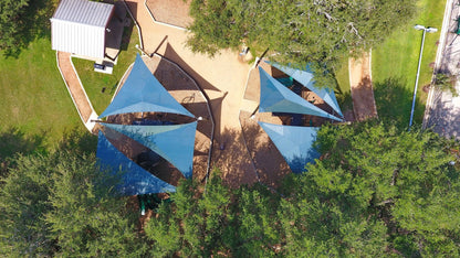 3 Point Triangle Sail Shade Structure example; pictured size and colors may vary