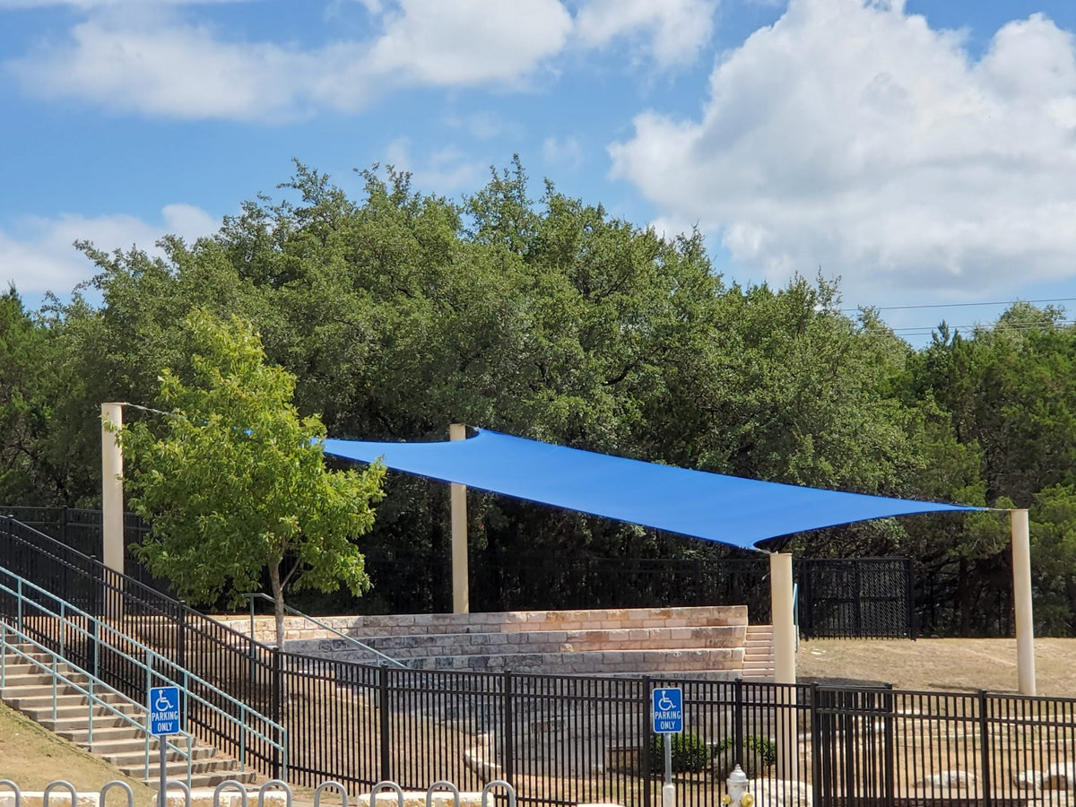 4 Point Sail Shade Structure example; pictured size and colors may vary