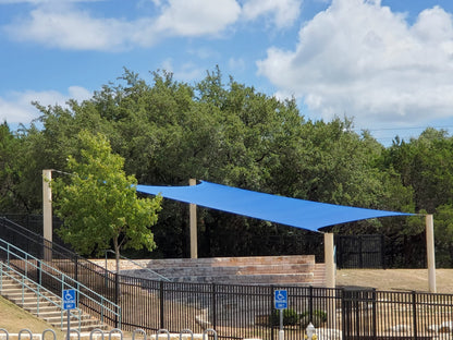 4 Point Sail Shade Structure example; pictured size and colors may vary