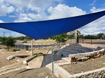 4 Point Sail Shade Structure example; pictured size and colors may vary
