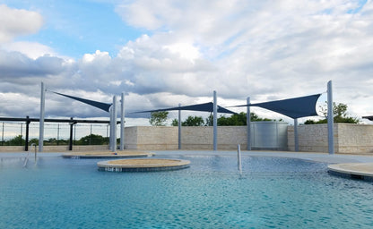 4 Point Sail Shade Structure example; pictured size and colors may vary