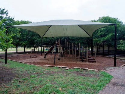 Hip Roof Shade Structure with 4 Posts and 14 Foot Entry example; pictured size and colors may vary