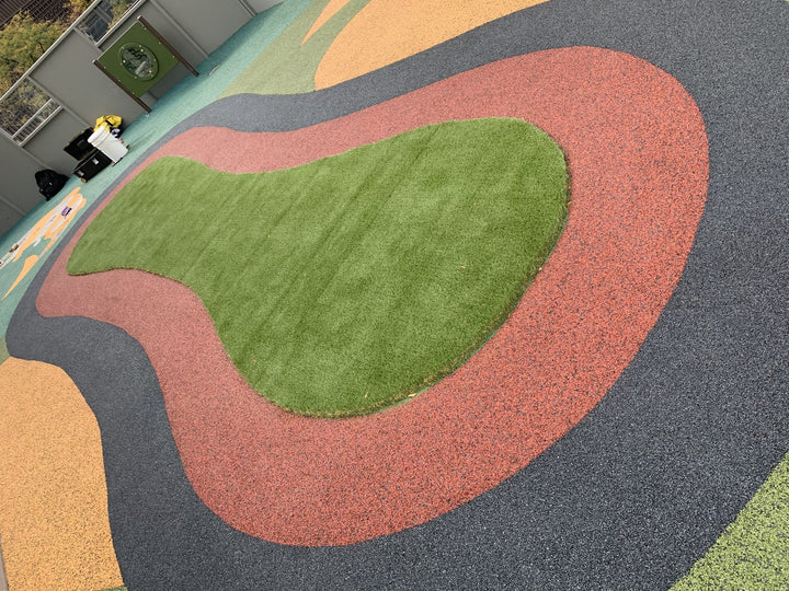 Poured in place rubber   turf island